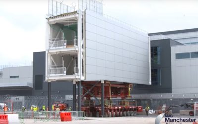 Manchester Airport wheels bridge into place [–with video]